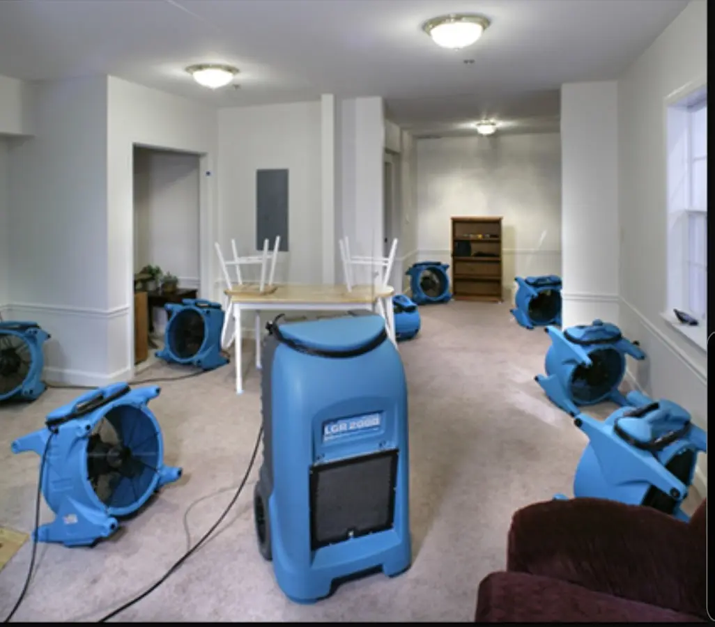 Air movers and dehumidifier setup for Water Extraction & Removal in Progress Village